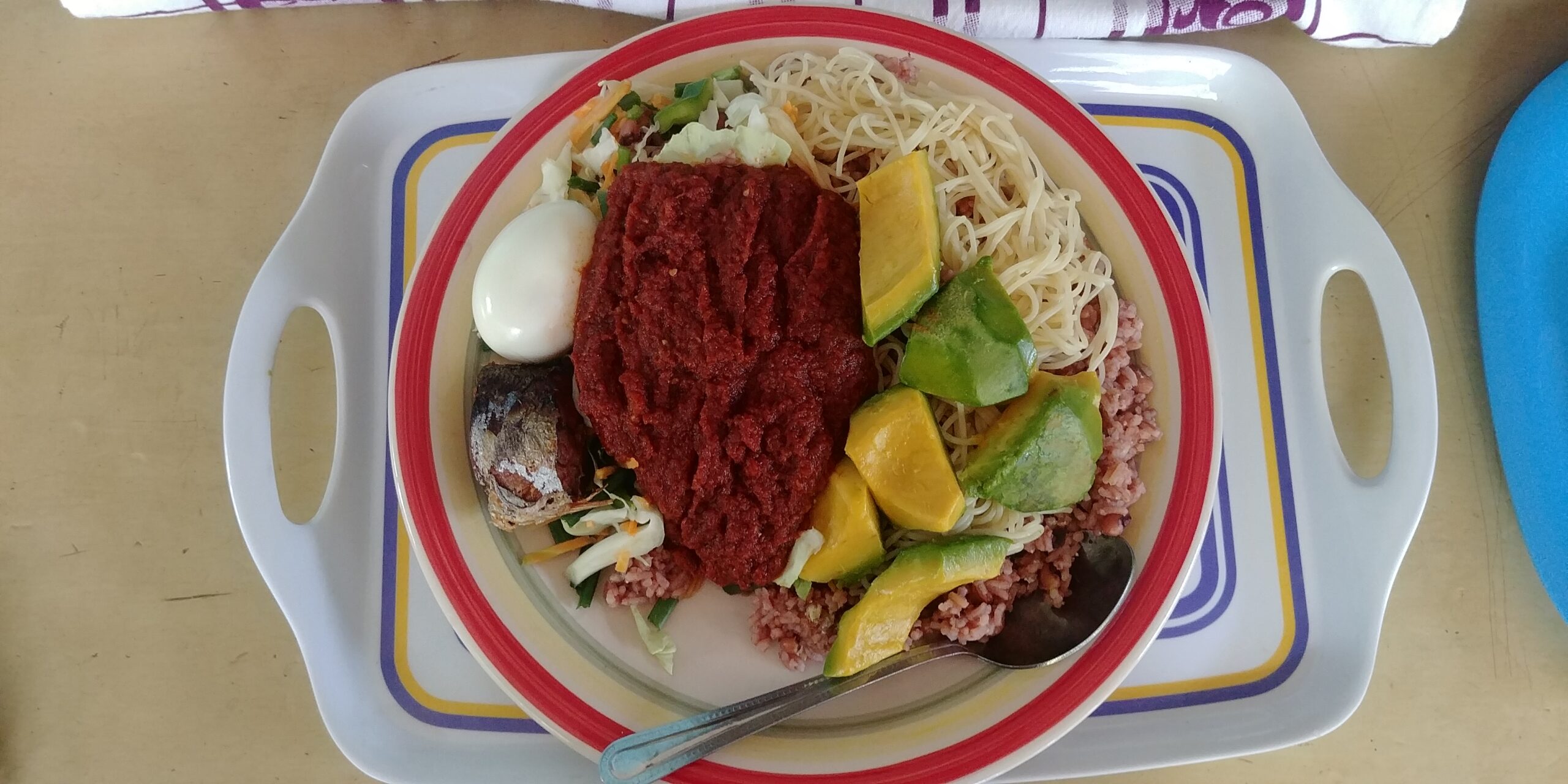 A plate of waakye, a popular Ghanaian meal